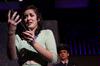 Mary, played by Abigail Ebensberger, freshman theater major, is dismayed by what she hears coming over the walkie-talkie in the Union University Players' presentation of "Zombies from the Beyond." - Photo by Megan Bailey
