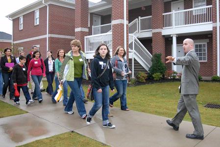 Mark Mogle, enrollment counselor, gives students and their families a tour of the campus during a recent Preview Day.