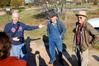 Stephen Carls, history department chair, introduces  Hyran Barefoot, former president of Union, and John Freeman, owner of Green Frog Village, to a group of history students that worked at the village for Campus and Community Day. - Photo by Kristi McMurry