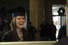 Tara Daniel, family studies graduate, takes a final look in the mirror before fall graduation ceremonies begin at West Jackson Baptist Church. - Photo by Beth Spain