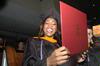 Shawanda Motlow, MSN graduate, shows her diploma during fall graduation. - Photo by Beth Spain