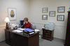 Suzanne Nadaskay works in the office of the Colleges of Arts and Sciences, located off of the main hallway in the Penick Academic Complex - Photo by Kristi McMurry