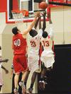 Greg Truvillion (23), Martez Hawkins (13). - Photo by Morris Abernathy