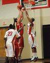 Keith Tolliver (35) goes up for the block. - Photo by Morris Abernathy