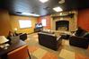 Students study in front of the fireplace in the Bowld Student Commons. - Photo by Morris Abernathy