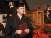 Graduate Jeff Lean looks to the future after receiving his diploma at December graduation.  - Photo by Jim Veneman