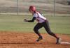 Amber Hayes, junior nursing major, rounds second base during a victorious double header against Missouri Baptist University - Photo by Morris Abernathy