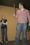 Natalie West, senior public relations major, and Scott McSwain, senior Spanish major, participate in a comedy sketch for Coffee and Comedy hosted by Junior Council.
 - Photo by Lauren Laster