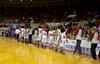 The Lady Bulldogs line up to shake hands with Southwestern Assemblies of God University players after a victory in Game 1 of the NAIA Women's Basketball National Tournament. - Photo by Jordan Buie