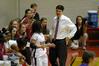 Coach Mark Campbell gives Jessica Graves, senior journalism major, a pep talk before she takes to the court in Game 1 of the NAIA Women's Basketball National Tournament against Southwestern Assemblies of God University. The Lady Bulldogs won 86-47. - Photo by Beth Spain
