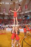 Union's cheerleaders cheer loud for the Lady Bulldogs in Game 1 of the NAIA Women's Basketball National Tournament against Southwestern Assemblies of God University. - Photo by Morris Abernathy