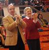 Dr. David S. Dockery, president of Union University, cheers with his wife Lanese Dockery for the Lady Bulldogs in Game 1 of the NAIA Women's Basketball National Tournament against Southwestern Assemblies of God University. - Photo by Morris Abernathy