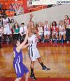 Ashley Lillard, junior psychology major, goes up for a lay-up in Game 1 of the NAIA Women's Basketball National Tournament against Southwestern Assemblies of God University. The Lady Bulldogs won 86-47.  - Photo by Morris Abernathy