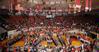 NAIA staff members spell out "NAIA" on the basketball court for the opening ceremonies of the Women's Basketball Tournament.  - Photo by Morris Abernathy
