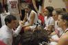 Mark Campbell, head women's basketball coach, talks with his players during a time-out in the Second Round game of the NAIA National Tournament. The Lady Bulldogs defeated Southern Polytechnic State University 70-47. - Photo by Jordan Buie