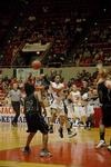 Jessica Graves, senior journalism major, passes the ball to a teammate in the Second Round game of the NAIA National Tournament against Southern Polytechnic State University. The Lady Bulldogs won 70-47. - Photo by Jordan Buie