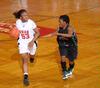 Lavanda Ross, sophomore accounting major, dribbles down the court in the Second Round game of the NAIA National Tournament against Southern Polytechnic State University. The Lady Bulldogs won 70-47. - Photo by Morris Abernathy