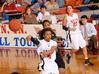 Jessica Graves, senior journalism major, makes a pass in the Second Round game of the NAIA National Tournament against Southern Polytechnic State University. The Lady Bulldogs won 70-47. - Photo by Morris Abernathy