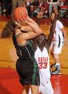 Zeinab Chan, junior history major, goes up to block a shot by Southern Polytechnic State University in the Second Round game of the NAIA National Tournament. The Lady Bulldogs won 70-47. - Photo by Morris Abernathy