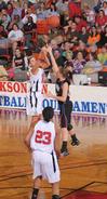 Kaitlin Dudley, senior physical education and health major, sinks a shot in the Quarterfinals game of the NAIA National Tournament against Oklahoma Christian University. The Lady Bulldogs won 83-55. - Photo by Morris Abernathy