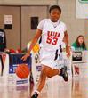 Lavanda Ross, sophomore accounting major, dribbles down the court in the Semifinals of the NAIA National Tournament against Oklahoma City University. The Lady Bulldogs advanced to the championship game with a win of 63-61. - Photo by Morris Abernathy