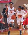 Sophomores Stacey Conway and Lavanda Ross run down the court in the Semifinals of the NAIA National Tournament against Oklahoma City University. The Lady Bulldogs advanced to the championship game with a win of 63-61. - Photo by Morris Abernathy