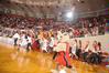 The Lady Bulldog basketball team, accompanied by Buster the Bulldog, rushes the court after defeating Oklahoma City University in the Semifinals of the NAIA National Championship.  - Photo by Morris Abernathy