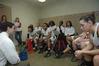 The Lady Bulldogs talk with Mark Campbell, head coach, about strategies during halftime of the Championship game of the NAIA National Tournament.  - Photo by Jordan Buie