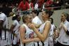 Kayla Hudson, junior political science major, and Kaitlin Dudley, senior physical education and health major, celebrate after their victory over Azusa Pacific University that made them the NAIA Division I National Champions.  - Photo by Jordan Buie