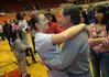 Kaitlin Dudley, senior, celebrates with her family after the Lady Bulldogs won the NAIA National Tournament for the second year in a row.  - Photo by Morris Abernathy