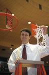 Mark Campbell, head coach, cuts down the rest of the net after the Lady Bulldogs defeated Azusa Pacific University to become NAIA Division I National Champions. - Photo by Morris Abernathy