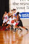 Ashley Lillard, senior, Lavanda Ross, sophomore, and Kaitlin Dudley, senior, defend against Azusa Pacific University in the Championship game of the NAIA National Tournament. The Lady Bulldogs won the game 73-65. - Photo by Morris Abernathy