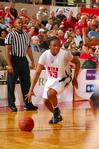 Lavanda Ross, sophomore accounting major, dribbles the ball down the court in the Championship game of the NAIA National Tournament. The Lady Bulldogs defeated Azusa Pacific University 73-65.  - Photo by Morris Abernathy