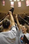 The Lady Bulldogs celebrate with their trophy after becoming NAIA Division I champions for the second year in a row. - Photo by Jordan Buie