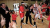 Union Lady Bulldog Mary Catherine Way is cheered by her teammates, Alumni Director Gary Williams, and Chemistry professor Charles Baldwin at the beginning of the Homecoming 2002 game against Trevecca Nazarene. - Photo by Jim Veneman