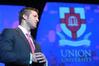 Tim Tebow speaks at the Roy L. White Legacy Golf and Gala event. - Photo by Morris Abernathy