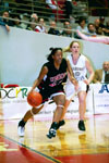 Union senior forward, Tashekia Brown (23) drive the baseline in the 2003 NAIA National Tournament. - Photo by Justin Veneman