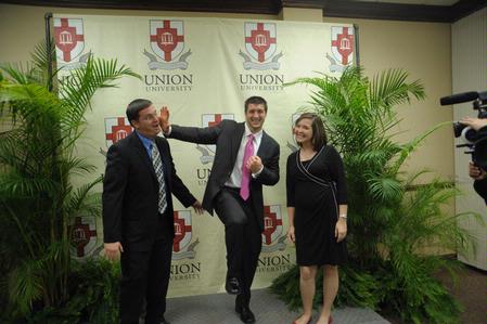 Tim Tebow, keynote speaker at the Roy L. White Legacy Golf and Gala, has a laugh with guests after the event.