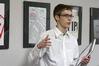 A.J. Shelby, sophomore digital media studies major, presents his poster for the student film "The Storm" during his Graphic Design II class. - Photo by Kristi McMurry
