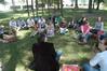 Students engage in discussion under the shade during a History of Christianity and Pop Culture class with Dr. Keith Bates, Assistant Professor of History. - Photo by Beth Spain