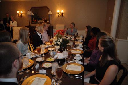 Mrs. Lanese Dockery, first lady of Union University, teaches students dinner-table etiquette. These skills are essential for lunch interviews that the students may encounter while on their job search. 