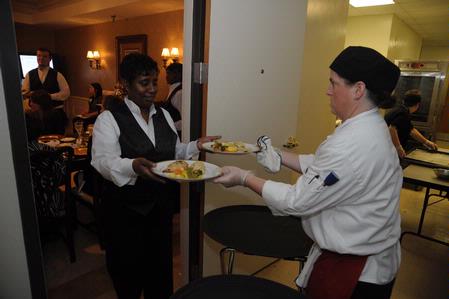 Aramark staff members work hard behind the scenes of the Etiquette Luncheon. 