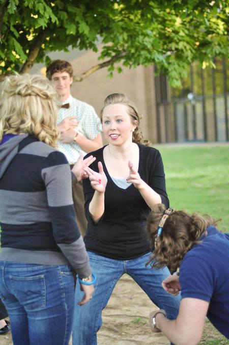 Jill Brown, senior french major, warms up before her final performance in the theatre's student directed one acts.