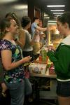 Students enjoy the free snack, drink and bag of popcorn provided by the Student Activities Council during the Movie in the Bowld Student Commons. - Photo by Lauren Laster