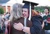 Theatre/Speech graduate, Margaret Broersma, hugs friends and family after the spring 2010 commencement ceremony.  - Photo by Abigail Harris