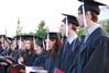 2010 graduates sing the Alma Mater at the close of the spring 2010 commencement ceremony.  - Photo by Abigail Harris
