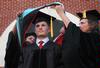 Matthew Brunett, director of wellness services, receives his doctorate degree during the Spring 2010 commencement ceremony. - Photo by Beth Spain