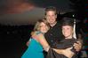 Natalie West, public relations graduate, celebrates with her family after the Spring 2010 graduation ceremony. - Photo by Beth Spain