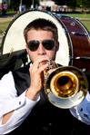Chase Techentin, sophomore music major, plays trumpet during the 2010 Spring Commencement Ceremony. - Photo by Ebbie Davis