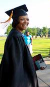Shemeka Davis, graduating nursing major, smiles during the processional to spring 2010 commencement ceremonies. - Photo by Ebbie Davis